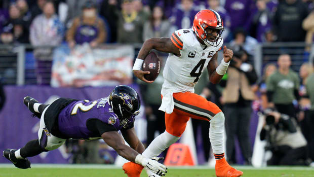 Nov 12, 2023; Baltimore, Maryland, USA; Cleveland Browns quarterback Deshaun Watson (4) runs with the ball as Baltimore Ravens defensive tackle Justin Madubuike (92) defends during the second half at M&T Bank Stadium. Mandatory Credit: Jessica Rapfogel-USA TODAY Sports
